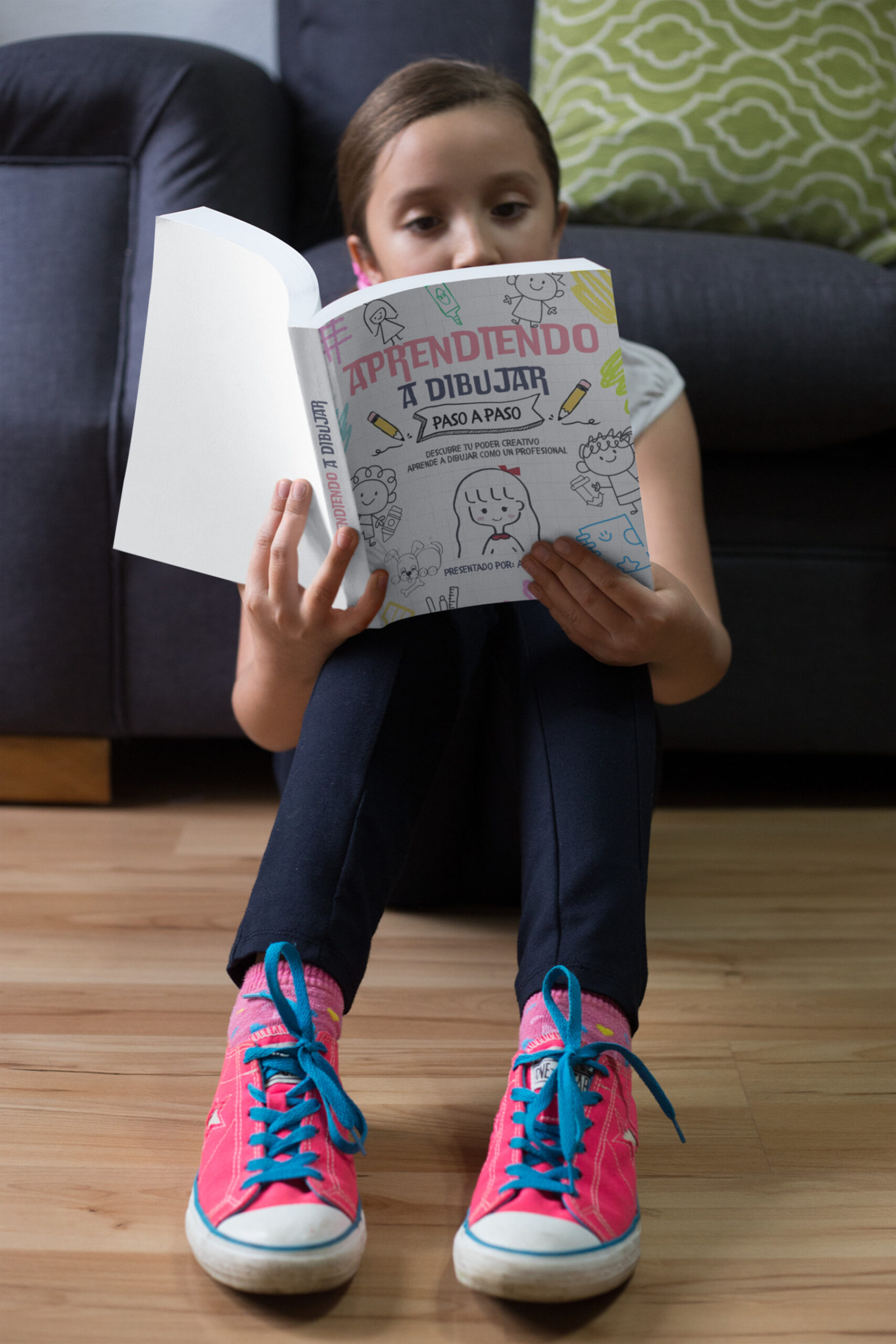 mockup-of-a-girl-reading-a-book-while-sitting-against-a-sofa-a19105